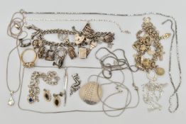 A SELECTION OF SILVER AND WHITE METAL JEWELLERY, to include a charm bracelet suspending eleven