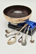 A SILVER BOWL AND ASSORTED SPOONS, the polished round silver bowl with brown Bakelite interior,