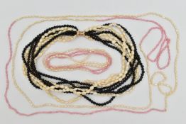 FOUR CULTURED PEARL NECKLACES, the first a multi strand necklace with white baroque pearls and