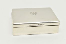 A GEORGE V SILVER CIGARETTE BOX OF RECTANGULAR FORM, engraved monogram to the hinged lid,