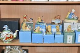 A COLLECTION OF BOXED WINNIE THE POOH COLLECTABLES, comprising a Pooh and Christopher Robin