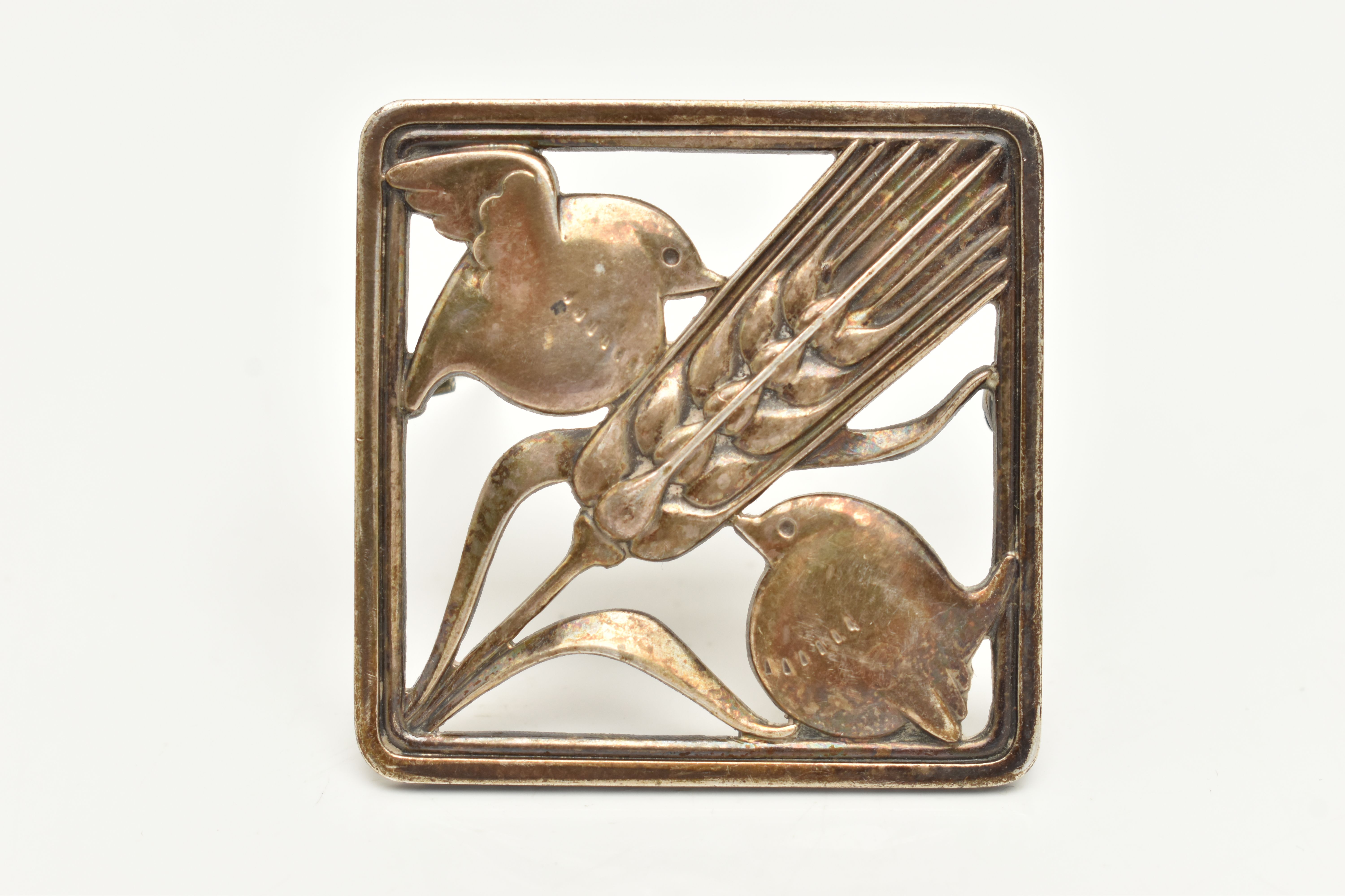 A 'GEORG JENSEN' BROOCH, of a square form depicting two birds either side of a wheat sheaf, fitted