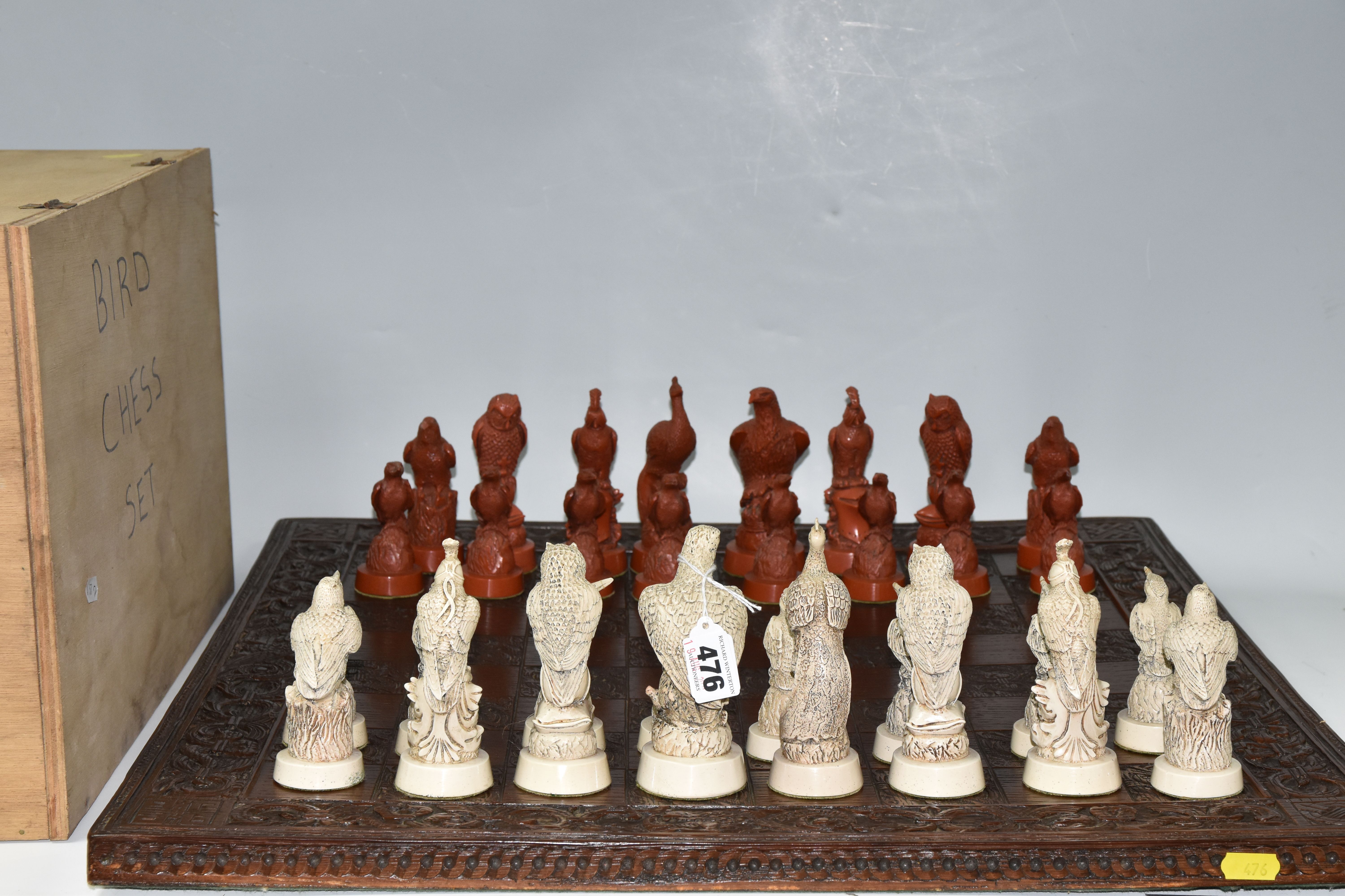 A BIRD THEMED RESIN CHESS SET, all the pieces formed as birds, several with minor damage and old