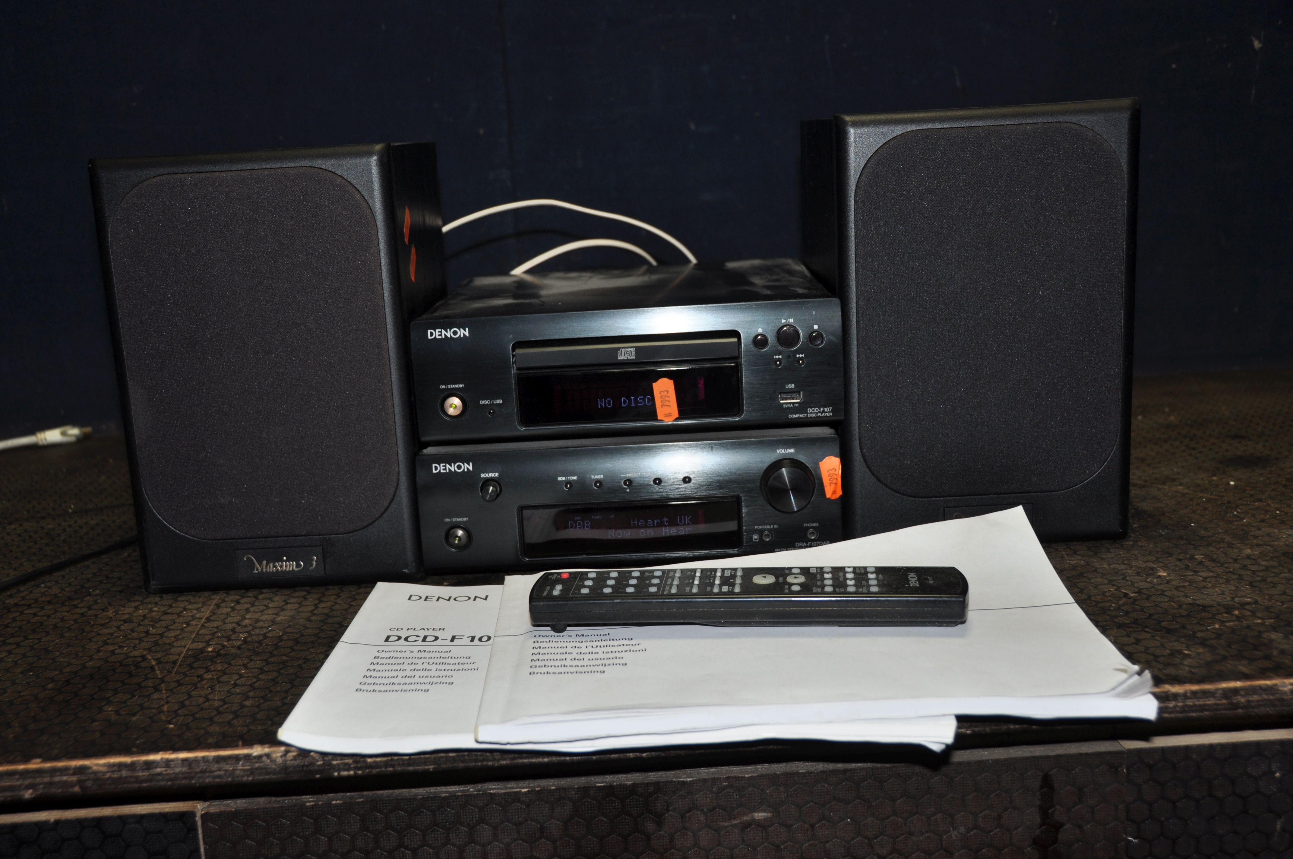 A DENON DRA-F107 DAB MINI HI-FI with two manuals, remote, a pair of Goodman's Maxim 3 speakers (