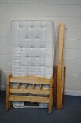 A SEALEY POSTUREPEDIC DE LUXE SINGLE MATTRESS, with a pine bedstead (condition report: bedstead