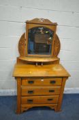 A 20TH CENTURY SATINWOOD DRESSING CHEST, with a single bevelled edge mirror, atop a base with