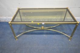 A BRASSED RECTANGULAR COFFEE TABLE, with a smoked glass insert, width 112cm x depth 57cm x height