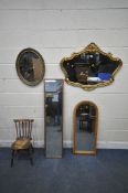 A GILT FRAME WALL MIRROR, 91cm x 69cm, an oval gilt mirror, two other mirrors, along with a child'