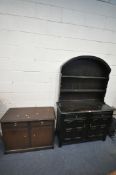 A 20TH CENTURY OAK DRESSER, the arched two tier plate rack, atop a base with two drawers and