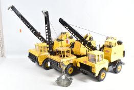 THREE UNBOXED PLAYWORN MIGHTY TONKA TRUCK MOUNTED GRAB CRANES, all are incomplete and/or have
