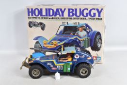A BOXED CONSTRUCTED TAMIYA RIKO PLASTIC RADIO CONTROL DUAL PURPOSE HOLIDAY BUGGY, No.RA1023, 1/10