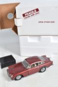 A BOXED DANBURY MINT 1964 ASTON MARTIN DB5, 1/24 scale, appears complete, has some damage to front