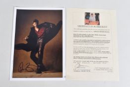 A SIGNED 11 X 7.5 PHOTOGRAPH OF DAVID BOREANAZ, portrait orientation, signed in black marker,