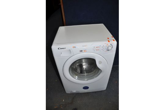 A CANDY GO F 662 WASHING MACHINE width 60cm depth 55cm height 84cm and an Electrolux vacuum - Image 1 of 2