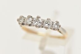 A FIVE STONE DIAMOND RING, a central old cut diamond with two round brilliant cut diamonds either