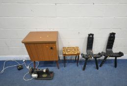 A PAIR OF EBONISED SPINNING CHAIRS, a sewing box, and a sewing machine (condition report: sewing