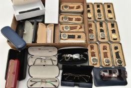 A BOX OF ASSORTED ITEMS, to include sixteen cased quartz wristwatches, detailed with car motifs to