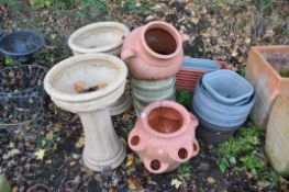A COLLECTION OF PLASTIC GARDEN ITEMS including a pair of stone effect planters on stands height