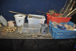 FOUR BOXES AND THREE TUBS CONTAINING FURNITURE ADORNMENTS including brass slamming strips, edging,