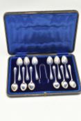 A GEORGE V CASED TEA SET, a large rectangular case lined with blue felt, encasing twelve teaspoons
