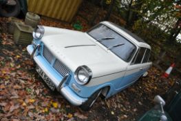 A 1970 TRIUMPH HERALD 1200 TWO DOOR SALOON CAR, in blue and white, with a 1147cc petrol engine, four