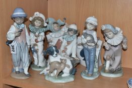 A GROUP OF EIGHT NAO FIGURINES AND ONE LLADRO FIGURE to include a Lladro figure No. 5928 'Jazz