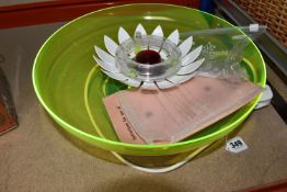 A VINTAGE MID-CENTURY INDOOR WATER FOUNTAIN with fluorescent green plastic bowl, and white lotus