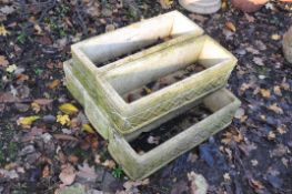 FIVE WEATHERED COMPOSITE RECTANGULAR GARDEN PLANTERS, with lattice detail to each facet, width 62cm,