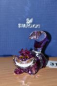 A BOXED SWAROVSKI CRYSTAL 'CHESHIRE CAT' FIGURE, from Disney's Alice in Wonderland, produced in