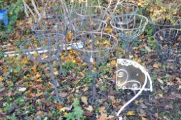 A SELECTION OF GARDEN METALWARE including a set of eight baskets on stands, height 72cm, and a
