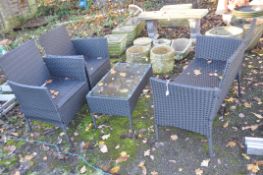 A MODERN RATTAN EFFECT GARDEN PATIO SET, consisting of a two seat sofa, width 100cm, two chairs