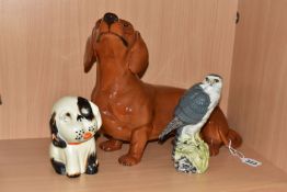 THREE CERAMIC FIGURES, comprising a Beswick tan Fireside Model Dachshund model no 2286, height 26.