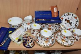 A GROUP OF ROYAL CROWN DERBY 'ASIAN ROSE' PATTERN COFFEE WARE, comprising six coffee cans, six
