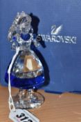 A BOXED SWAROVSKI CRYSTAL 'ALICE' FIGURINE, from Disney's Alice in Wonderland series, comprising '