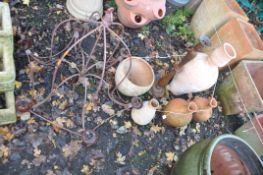 A SELECTION OF TERRACOTTA, EARTHENWARE AND CAST IRON GARDEN ITEMS including a pair of sewers 30cm