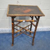 A 19TH CENTURY JAPANESE BAMBOO OCCASIONAL TABLE, the ebonised finish depicting birds and foliate