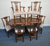 A BRADLEY MAHOGANY OVAL EXTENDING DINING TABLE, with one additional leaf, raised on a single