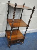 AN EARLY 20TH CENTURY ROSEWOOD THREE TIER WHAT-NOT, with spiral supports, a single drawer, raised on