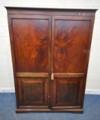 A 20TH CENTURY MAHOGANY WARDROBE, with double wide opening doors, width 141cm x depth 59cm x
