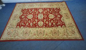 A PRADO RUGS KASHIMAR RUG, with repeating foliate patterns, surrounded by a multi-strap border,