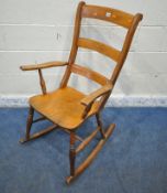 AN EARLY 20TH CENTURY ELM SEATED ROCKING CHAIR, width 62cm x depth 71cm x height 103cm (condition