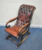 AN OXBLOOD BUTTONED LEATHER CHESTERFIELD STYLE SLIPPER ROCKING CHAIR, with open armrests, width 59cm