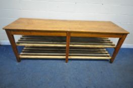 A LARGE PINE RECTANGULAR FARMHOUSE STYLE ISLAND TABLE, raised on six square tapered legs, united