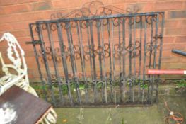 A PAIR OF WROUGHT IRON DRIVEWAY GATES, width of each gate 109cm height 100cm