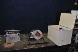 AN ELU MH265 CIRCULAR SAW with bespoke box, parallel guide, and spare blade along with a Lion Tool