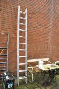 A CLOW 30 ALUMINIUM DOUBLE EXTENSION LADDER with eleven rungs to each 300cm section