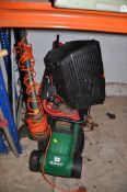 A QUALCAST ELECTRIC LAWN MOWER with collection box and a Black and Decker strimmer (both PAT pass