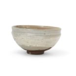 A Japanese Seto Hakame stoneware teabowl Edo period The thickly potted bowl rising from short f...