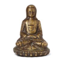 A Tibetan copper-alloy figure of a seated teacher, lama 16th/17th century Seated in padmasana o...