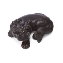 A Chinese bronze 'bixie' scroll weight Qing dynasty, 18th/19th century The recumbent beast well...